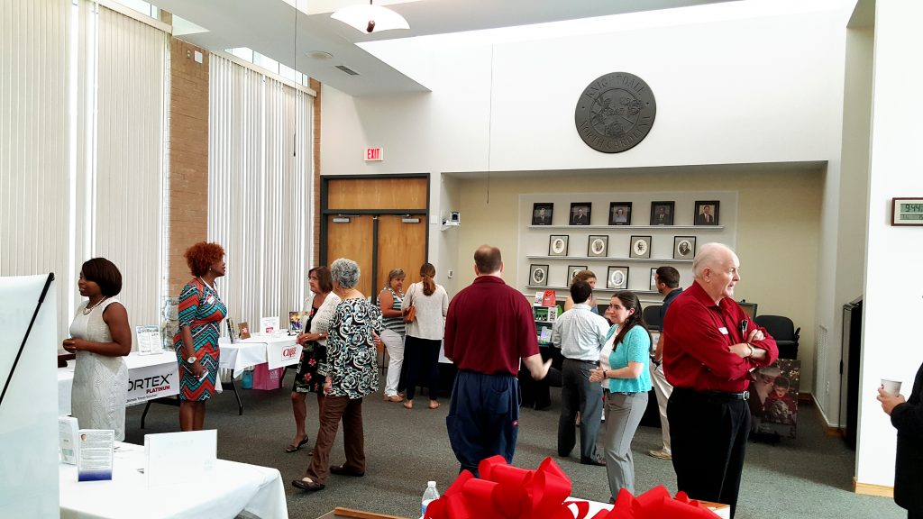 Networking at the Red Ribbon showcase, August 2016. Source: Knightdale Chamber of Commerce, Knightdale NC.