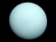 Arriving at Uranus in 1986, Voyager 2 observed a bluish orb with extremely subtle features. A haze layer hid most of the planet's cloud features from view. Credit: NASA/JPL-Caltech.