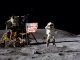 John Young on the Moon, with the Lunar Module and Lunar Rover in the background. Credit: NASA