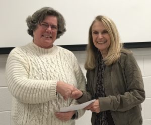 Ellen Queen awarding the Carolina Prize for Writing to Poetry Winner Sylvia Freeman for her "Fontevraud Abbey" poem. Source: Franklin County Arts Council, December 2018